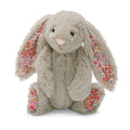 Coniglietto peluche con dettagli floreali