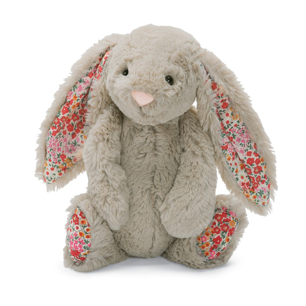 Coniglietto peluche con dettagli floreali